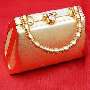 Monedero pequeño vintage de lamé dorado con estuche rígido, muy buen estado 04687