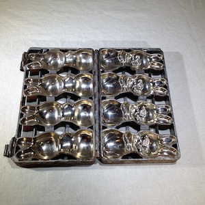 Antique Hinged Candy Mold Featuring Four 5 Inch Classic Pose Rabbits    04418