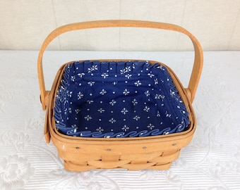 Vintage Longaberger Basket 6 1/2 by 6 1/2 with 1 Folding Handle Held with Copper Rivets Blue Cloth Liner  04951