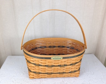 Cesta ovalada vintage grande Longaberger 1995 Traditions Collection con asa plegable de 15 1/4 x 10 3/4 x 7 1/2 con revestimiento de plástico 04982