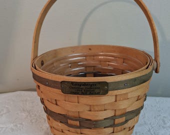 Cestino vintage Longaberger 'Jingle Bell' della collezione natalizia del 1994 da 7 3/4 pollici con manico girevole e rivestimento in plastica 05126