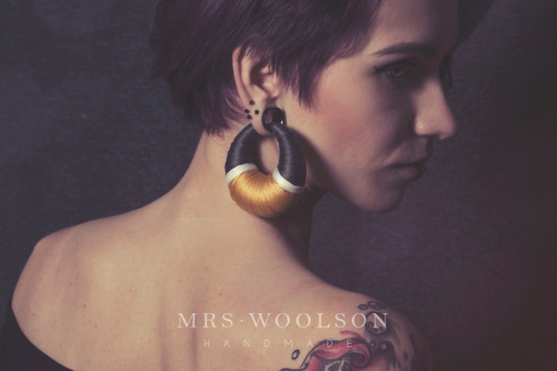 Hoopla earrings for tunnels streached ears Good as ear weights.