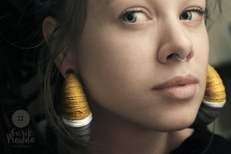 Hoopla earrings for tunnels streached ears Good as ear weights.