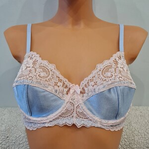 Handmade bra in light blue satin and light pink lace