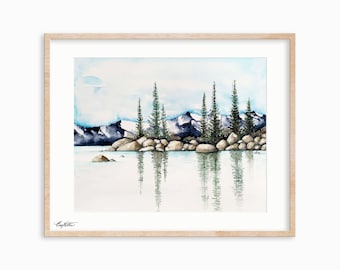 May include: Watercolor painting of a mountain lake scene with a row of evergreen trees reflected in the water. The trees are on a small island with rocks and the mountains are in the background.