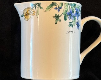 Majesticware Coffee Creamer by Sakura  geranium design by Sue Zipkin 1997