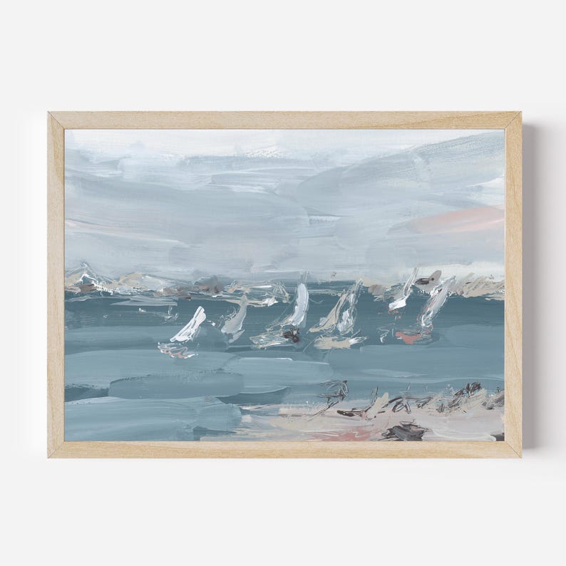 May include: A framed painting depicting a seascape with sailboats in the distance. The sky is a light blue with white clouds, and the water is a darker blue. The painting is executed in a loose, impressionistic style.