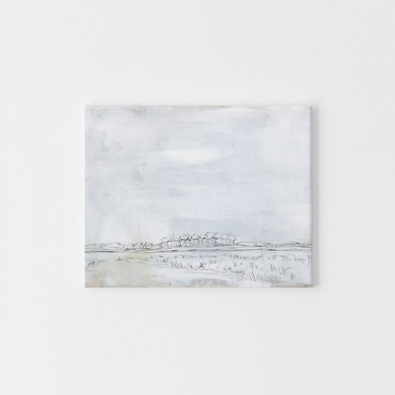 May include: A minimalist painting of a landscape with a line of trees in the distance. The sky is a light blue with a hint of gray, and the ground is a light brown. The painting is done in a simple, abstract style.