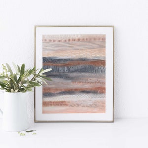 May include: A framed abstract art print with a layered design of horizontal lines in shades of brown, gray, and white. The lines are textured and have a hand-painted look.