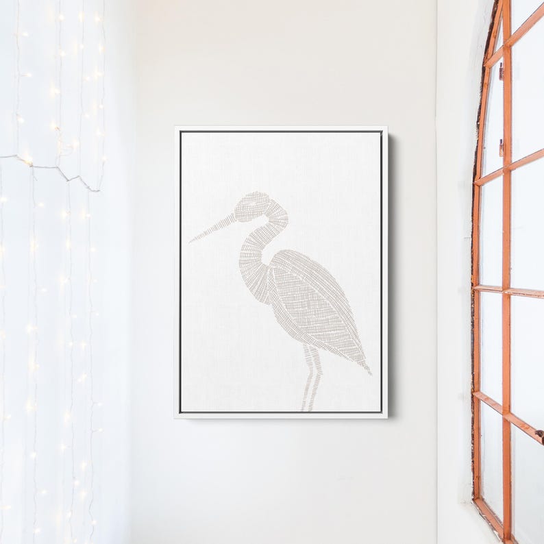 May include: A white canvas print with a detailed line drawing of a heron in a light gray color.