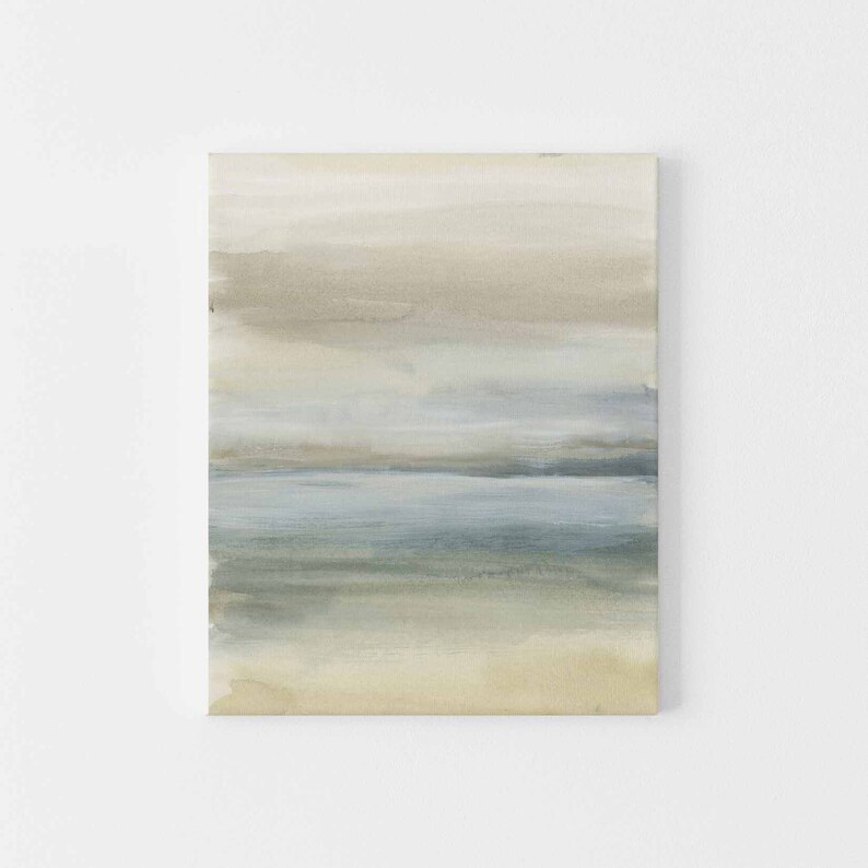 May include: Abstract painting with horizontal brushstrokes in shades of beige, blue, and green. The painting evokes a calming seascape with layers of color representing the sky, water, and sand.