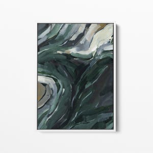 May include: Abstract painting with swirling green, blue, and white paint. The painting has a textured look and is framed in a white frame.