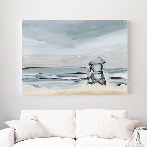 May include: A painting of a blue lifeguard stand on a beach with a cloudy sky. The painting is done in a loose, abstract style.