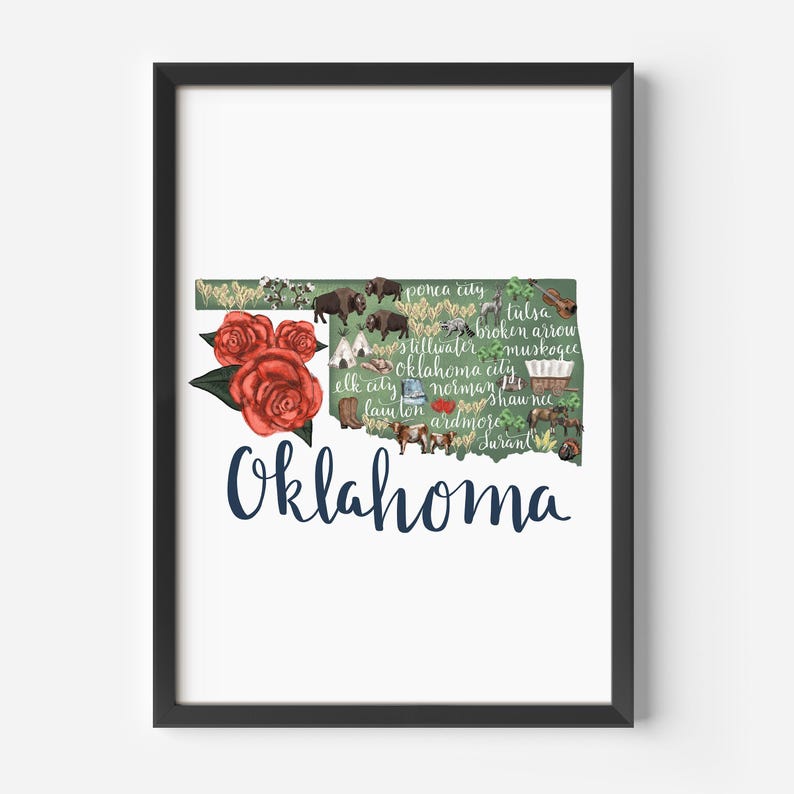 May include: A green outline of the state of Oklahoma with the names of cities and towns inside. The outline is decorated with red roses, buffalo, and other imagery. The word "Oklahoma" is written in blue cursive at the bottom.