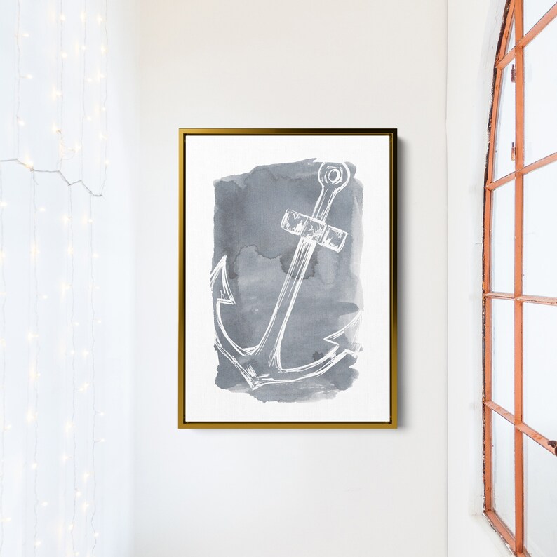 May include: A framed watercolor painting of a white anchor on a gray background. The anchor is drawn in a simple, sketched style.