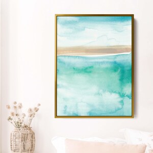 May include: Abstract watercolor painting of a seascape with a light blue sky, white clouds, a brown sand beach, and turquoise blue water.