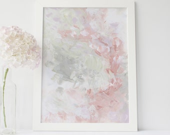 May include: A framed abstract painting with pink, gray, and white brushstrokes. The painting is in a white frame and is hanging on a white wall.