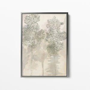 May include: A framed abstract art print with two stylized trees in shades of green and gray on a beige background.