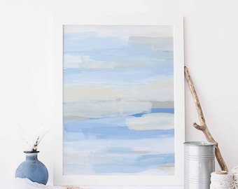 Puede incluir: Impresión de arte abstracto con un marco blanco. La impresión presenta un diseño de acuarela azul y gris con pinceladas horizontales.