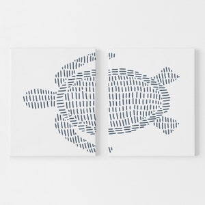 May include: A split canvas wall art print featuring a stylized line drawing of a sea turtle in shades of blue against a white background.