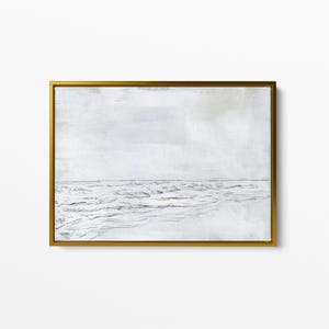 May include: A framed black and white sketch of a seascape with waves crashing on the shore. The background is a light blue and the waves are drawn in a simple, minimalist style.