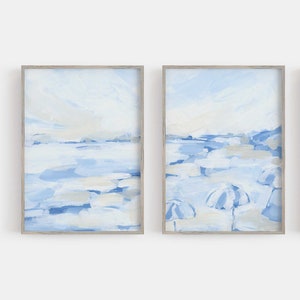 Kustschilderijset | Blauw en wit modern strandachtig decor tweeluik muurkunst | &quot;August Daze&quot; - set van 2 - kunstafdrukken of canvasdoeken