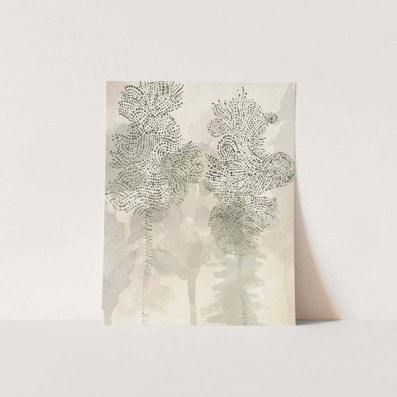 May include: A watercolor print featuring two stylized trees with a dotted pattern in shades of green on a beige background.