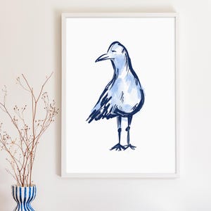 Coastal Bird Wall Decor | Blue Minimalist Seagull Artwork for Nautical Gallery Walls or Beach Home Entryways | &quot;Sea Scout&quot; – Print or Canvas