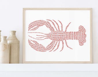 May include: A framed print of a red lobster illustration. The lobster is made up of small red lines that create a textured look.