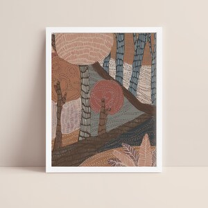 May include: Abstract art print featuring a stylized forest scene with trees and foliage in shades of brown, pink, blue, and gray. The print has a textured, hand-drawn look.
