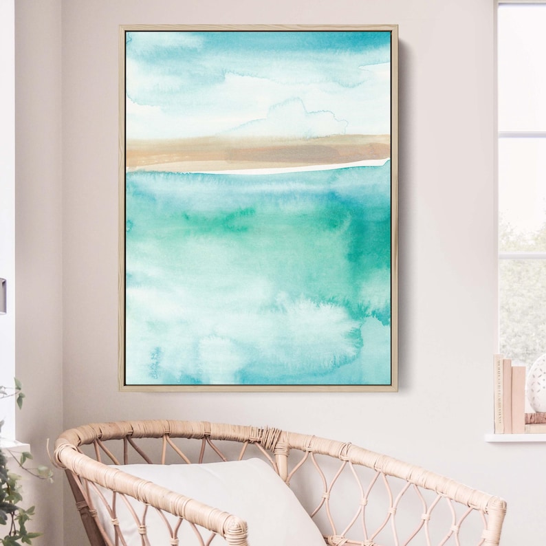 May include: Abstract watercolor painting of a seascape with a light blue sky, a brown sand beach, and turquoise ocean water.