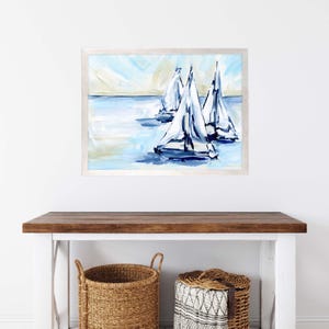 May include: A painting of three sailboats on a blue and white ocean. The sailboats are white with blue accents and are sailing in a line. The sky is blue with white clouds.