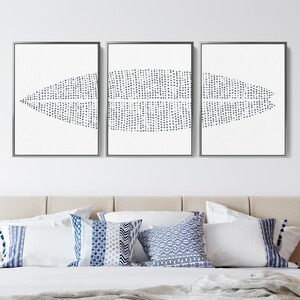 May include: Three framed prints with a white background and a gray abstract design of a series of dots forming a curved shape.