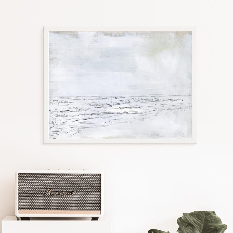 May include: A framed abstract painting of a seascape with a light blue and gray background and a black and white line drawing of waves in the foreground.