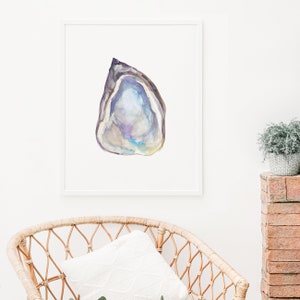 May include: A watercolor painting of a purple and blue seashell with a white background.