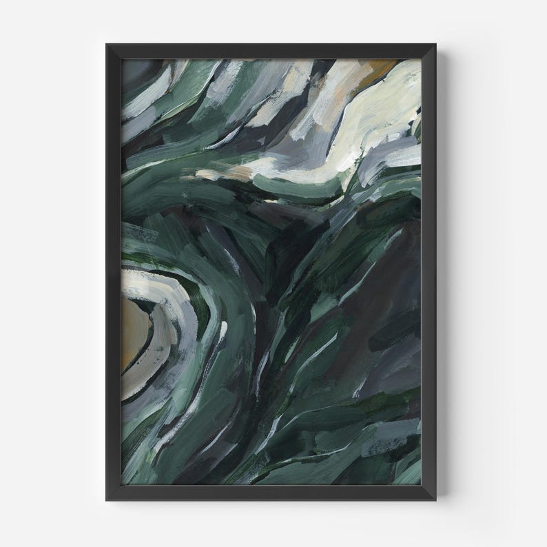 May include: Abstract painting with swirling green, blue, and white paint strokes. The painting is framed in a black frame.