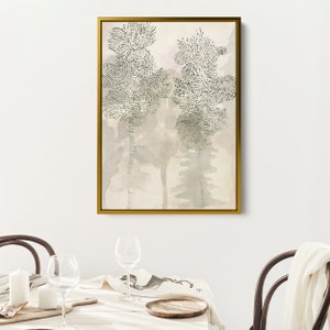May include: A framed abstract art print with a beige background and two stylized trees in shades of green and gray.