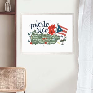 May include: A white background with a stylized map of Puerto Rico. The map is green and features red hibiscus flowers and a blue and white Puerto Rican flag. The text "puerto rico" is written in blue cursive lettering above the map. The map also includes the names of various cities and towns in Puerto Rico.