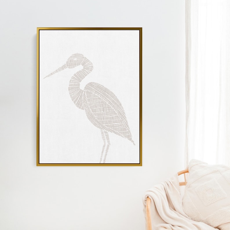 May include: A framed print of a white heron with a detailed line drawing design. The heron is outlined in a light brown color and is set against a white background.