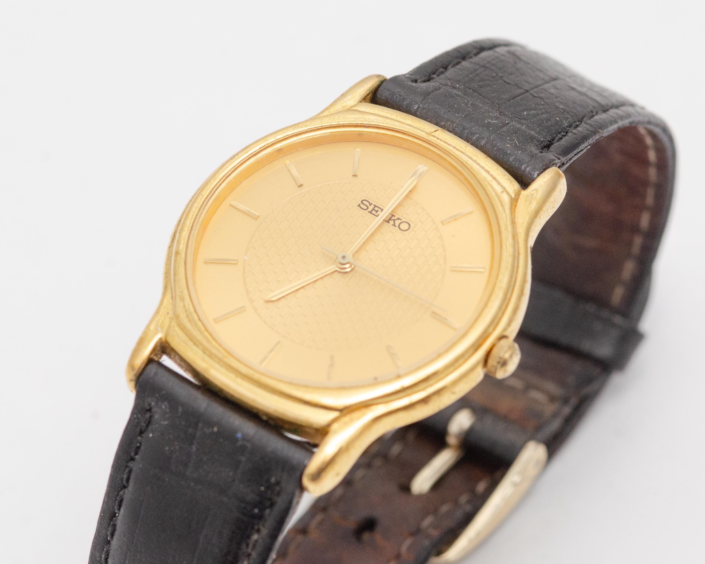 Vintage Seiko V701-A100 Gold Tone Round Dial Quartz Watch - Etsy