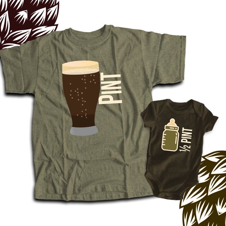 May include: Olive green adult t-shirt with a graphic of a pint of beer and the word "PINT" in white. A brown baby onesie features a baby bottle graphic and the text "1/2 PINT".