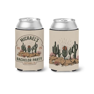 May include: A tan can cooler with a desert scene featuring cacti and a setting sun. The text "MICHAEL'S BACHELOR PARTY SCOTTSDALE, AZ" is printed on the cooler.