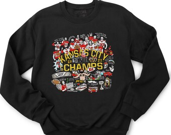 May include: Black sweatshirt with a graphic print of a Kansas City Chiefs Super Bowl victory celebration. The print features the team's logo, players, and other details related to the win. The text "Kansas City Champs" is prominently displayed in yellow.