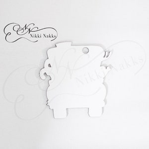 May include: White cutout of a fire engine with a hole for hanging. The engine has a ladder and a hose. The cutout is made of a thick, sturdy material.