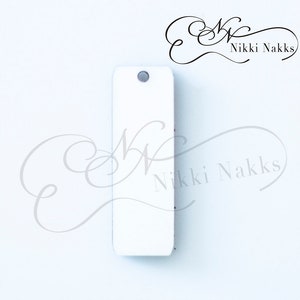 May include: White rectangular tag with a hole at the top. The tag is blank and ready to be personalised.