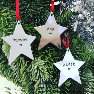 Personalised Christmas Tree Decoration. Hanging Star hand stamped with name