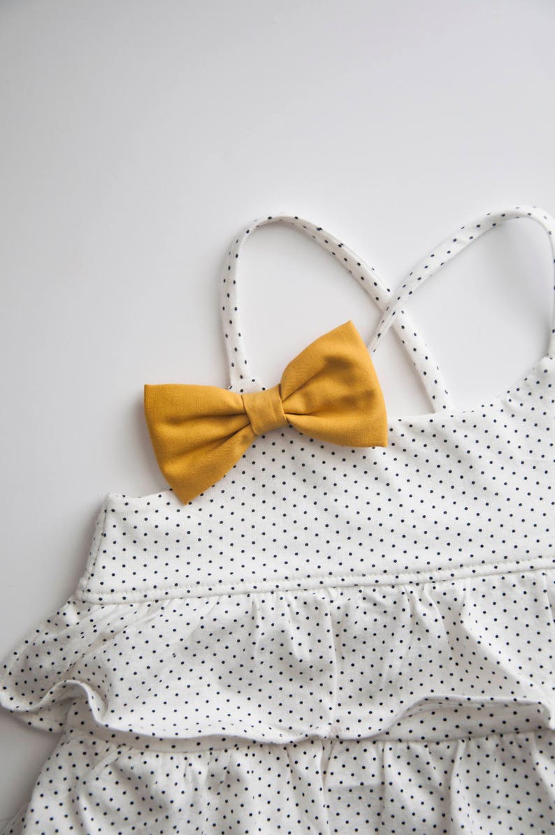 mustard baby bow