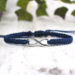 Set of 2 Adjustable Cord Bracelets for Women Made Zinc Alloy Rhodium Plated Charm Friendship String Bracelets for Women Black & Red Infinity Charms Set of 2 Adjustable Cord Bracelets for Women Made Zinc Alloy Rhodium Plated Charm Friendship String Bracelets for Women Black & Red Infinity Charms