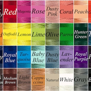 May include: A color chart of 36 different colors of thread, arranged in four rows of nine colors each. The colors are labeled with their names, such as "Burgundy", "Red", "Magenta", "Rose", "Dusty Pink", "Coral", "Peach", "Orange", "Gold", "Daffodil", "Lemon", "Lime", "Olive", "Parrot", "Hunter Green", "Teal", "Navy", "Royal Blue", "Turquoise", "Baby Blue", "Dusty Blue", "Lavender", "Royal Purple", "Plum", "Dark Brown", "Medium Brown", "Light Brown", "Cappuccino", "Natural", "White", "Gray", and "Black".
