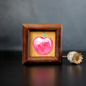 Mini cherry still life watercolor painting on gold – decorative vintage kitchen art, 6.5 x 6.5 cm | Judit Fortelny Fine Art